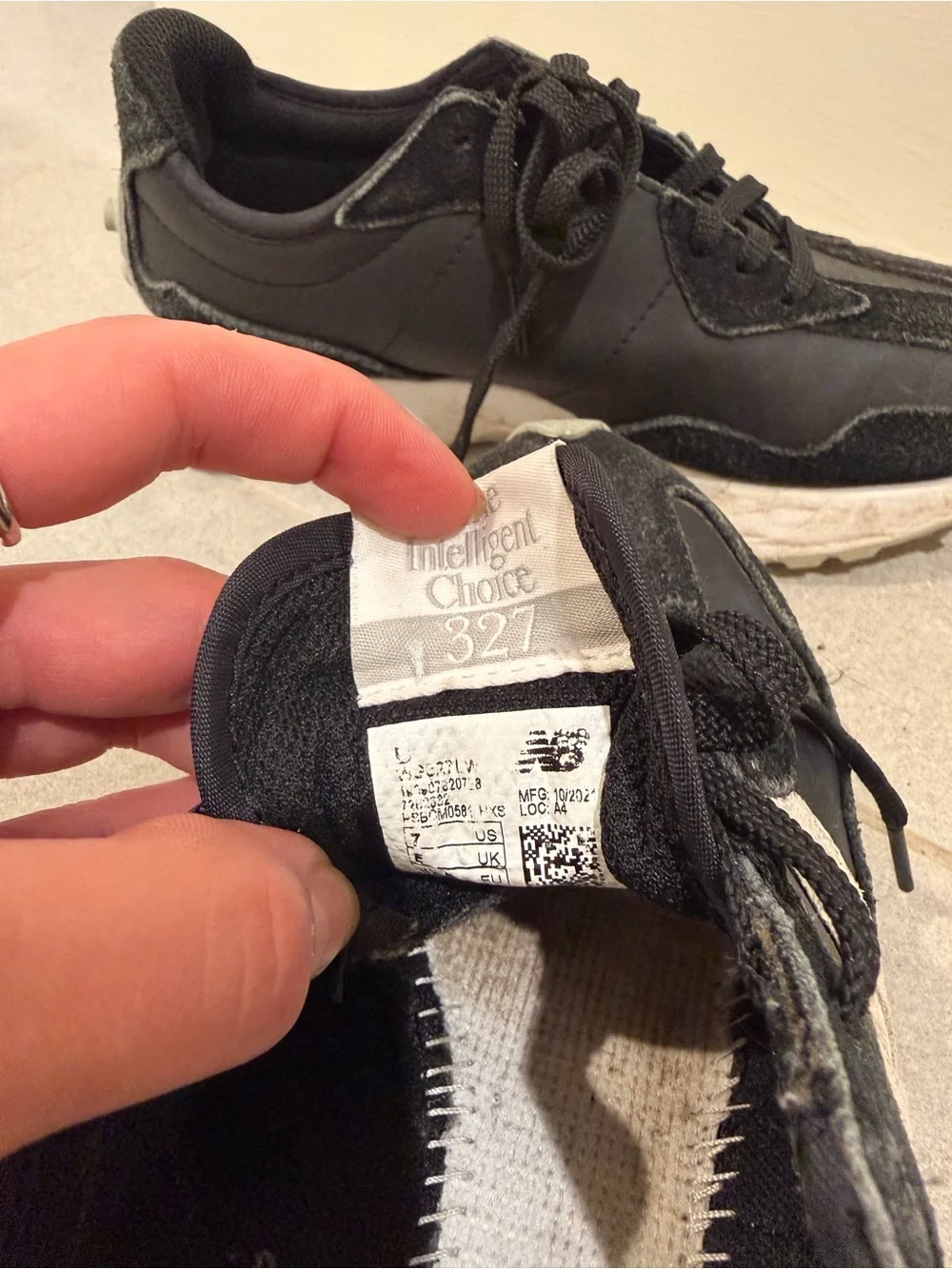 New Balance Women’s Black and White Sneakers